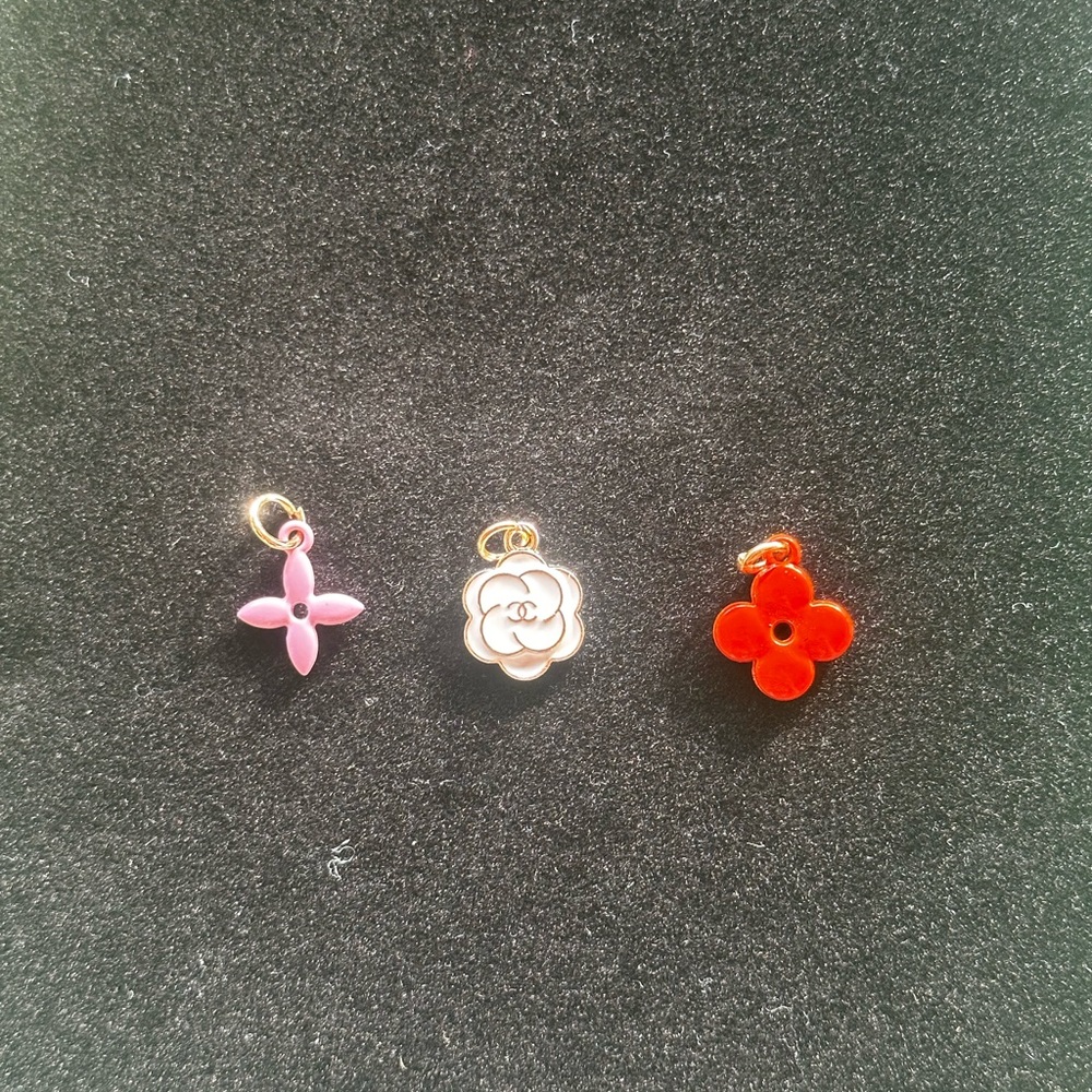Upcycled Charms Lot of Three will come with one gold toned chain